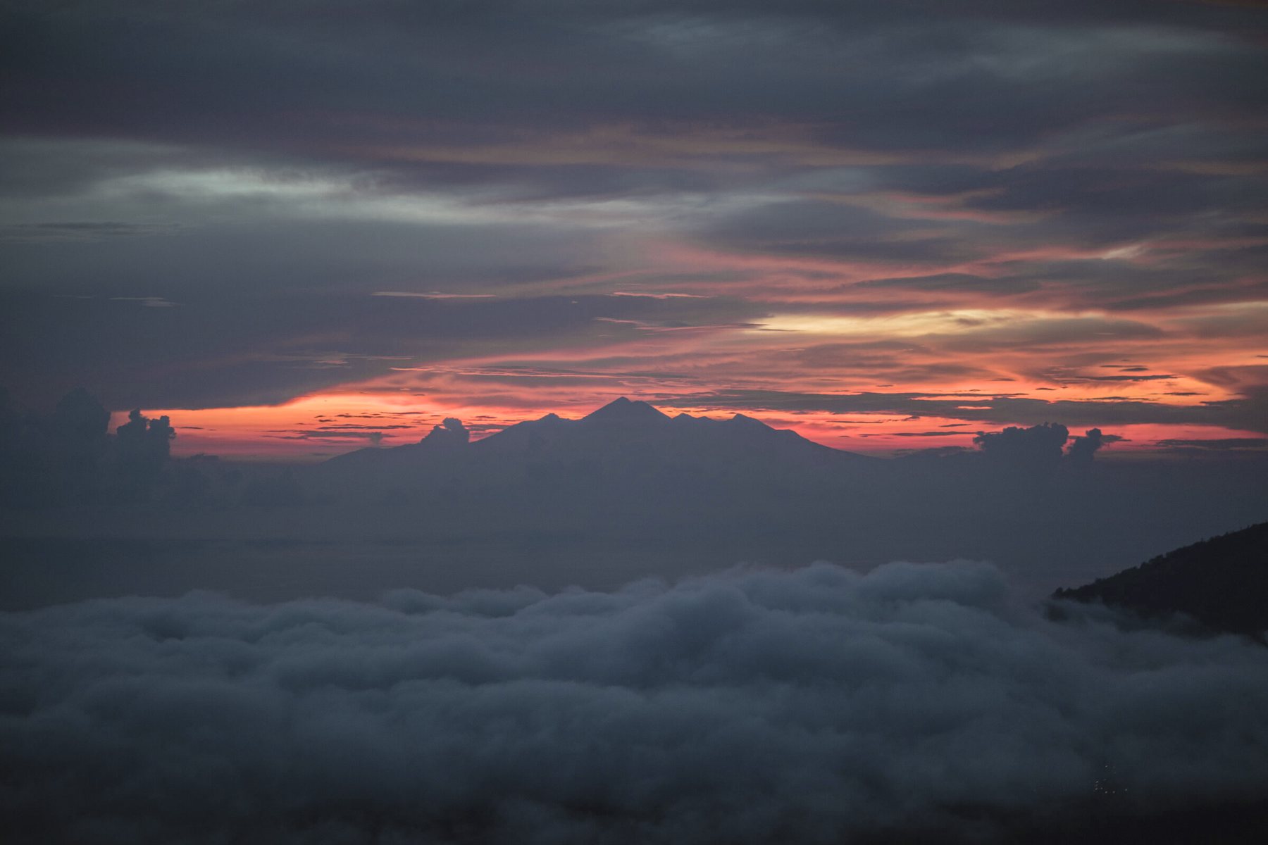 Sunrise above the clouds at Mount Batur